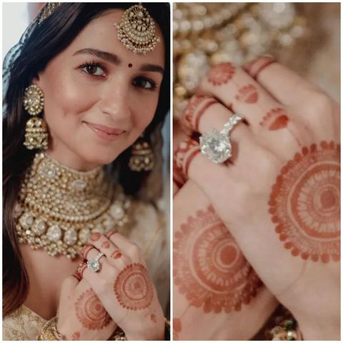 a woman with henna and jewelry on her hands