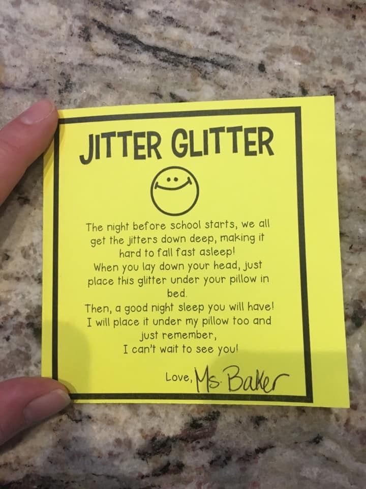 a hand holding a yellow piece of paper with a poem written on it that says, jitter glitter