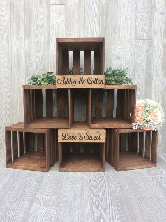 three wooden crates with plants in them and the words happy & cotton printed on them