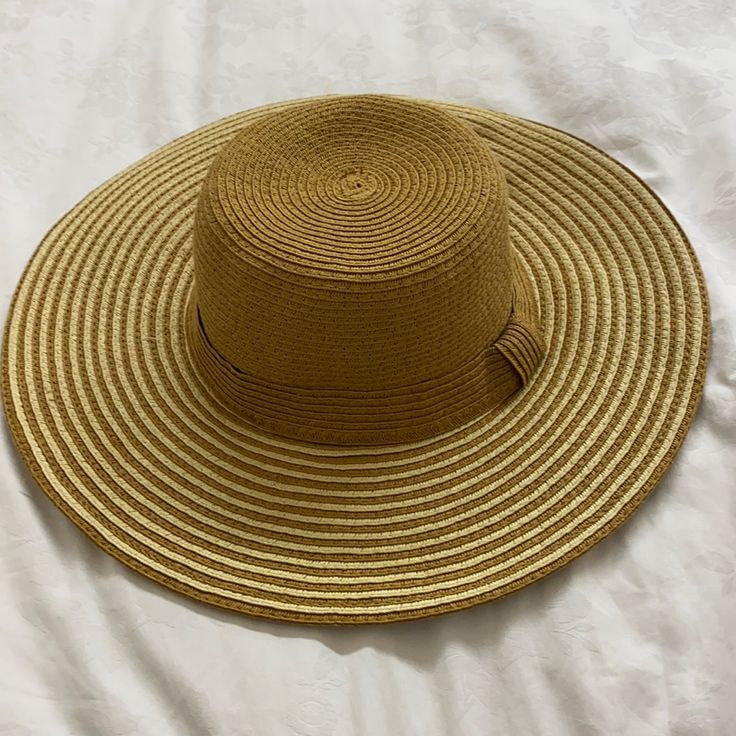 Never Worn Beige And Camel Straw Sun Floppy Hat. One Size Fits All. Perfect For Summer Beach Days And Trips. Matches Back To Everything With The Neutral Color Scheme. Brand Is Mint By Goorin Gold Fedora With Curved Brim For Beach, Gold Wide Brim Fedora For Beach, Gold Curved Brim Fedora For Beach, Chic Beige Beach Hat, Chic Brown Fedora For Beach, Chic Brown Fedora For The Beach, Gold Summer Fedora Straw Hat, Gold Wide Brim Straw Hat For Summer, Gold Straw Hat For Vacation