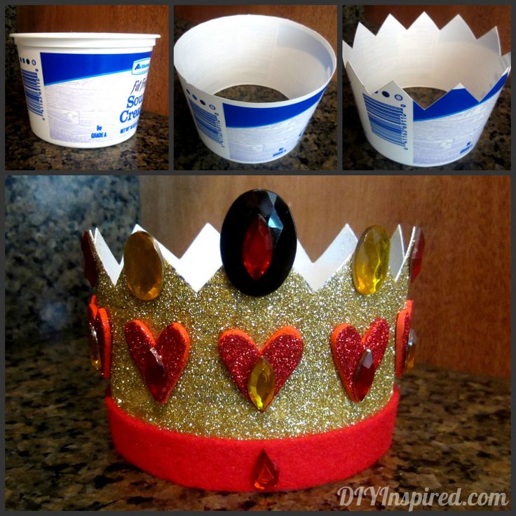 a red and gold crown sitting on top of a counter