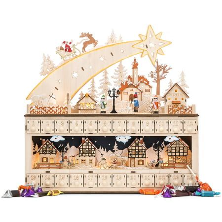 a wooden clock with christmas scenes on it