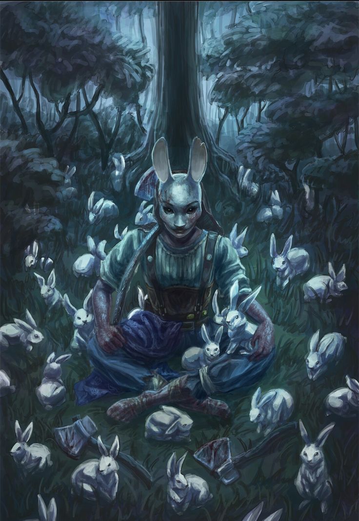 a person sitting in the middle of a forest surrounded by rabbits