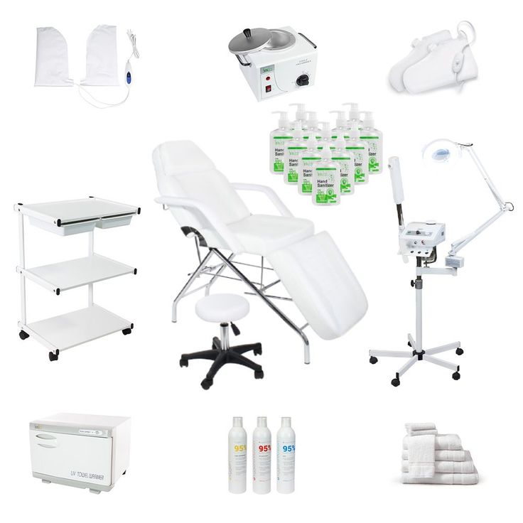 an assortment of medical equipment including a table, chair and other items on a white background