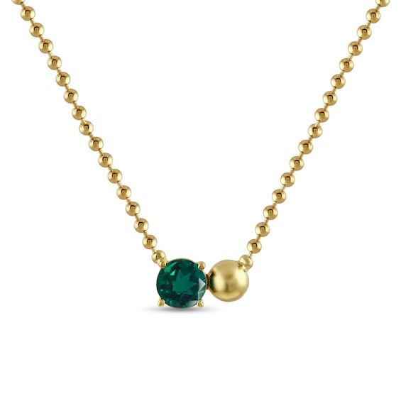 Simple beauty radiates from this dainty toi et moi necklace. Sterling silver with 24K gold plate A 7.0mm green lab-created emerald cozies up to a single polished bead at the center 16.0- to 18.0-inch adjustable bead chain necklace; lobster claw clasp Gold Emerald Round Bead Necklaces, Gold Emerald Bead Necklaces, Bead Chain Necklace, Lab Created Emerald, Emerald Bead, Bead Chain, Simple Beauty, Necklace Sterling Silver, Beaded Chain