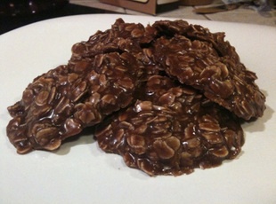 chocolate cookies are stacked on top of each other