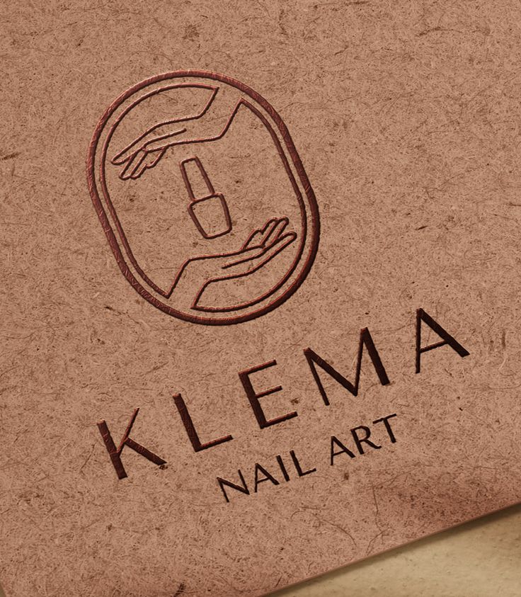 the klema nail art logo is shown on a brown cardboard box with black ink