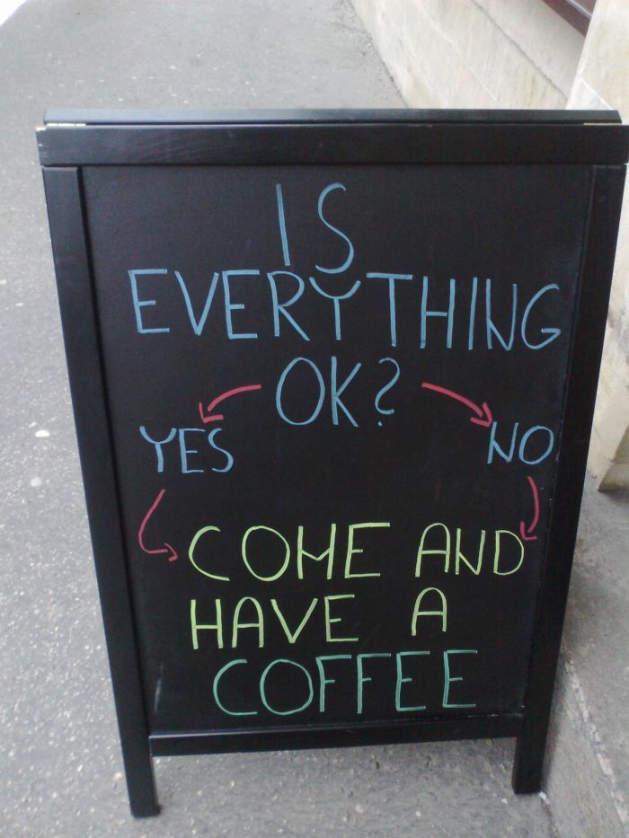 a chalkboard sign that says it's everything yes ok? no one and have a coffee