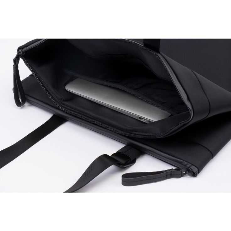 The SALM is a stylish tote that can be carried by hand, or over the shoulder, tucked under the arm. Two separate zippered compartments allow you to organise your laptop, documents and belongings. Made from black 100% Nylon with a silky feel. [Details] Composition: 100% Nylon Height: 44cm Width: 38cm Color: Black Shape: Tote (18 Litre) Features: Water Resistant, Expandable Compartment, Padded Device Pocket Functional Tote Briefcase For On-the-go, Functional On-the-go Tote Briefcase, Functional Double Handle Briefcase For Everyday Use, Black Briefcase With Zipper Pocket For On-the-go, Black Laptop Bag With Sleeve Satchel, Modern Black Satchel With Zipper Pocket, Modern Shoulder Bag With Zipper For Commuting, Black Laptop Bag With Zipper Pocket For Daily Use, Functional Laptop Tote Bag With Sleeve