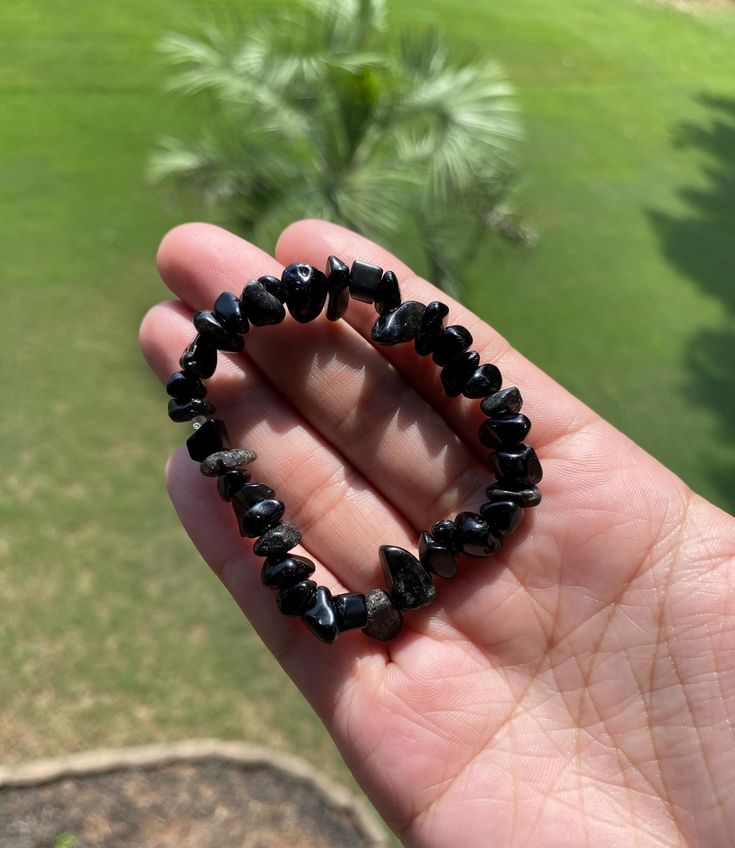 Made with a mixture of black onyx and obsidian. Handmade Onyx Black Bracelets, Handmade Black Onyx Bracelets, Hand-strung Obsidian Bracelet, Handmade Black Crystal Bracelet, Round Obsidian Jewelry With Black Beads, Black Agate Jewelry With Black Beads, Black Onyx Jewelry With Black Beads, Black Agate Jewelry For Healing, Black Agate Healing Jewelry