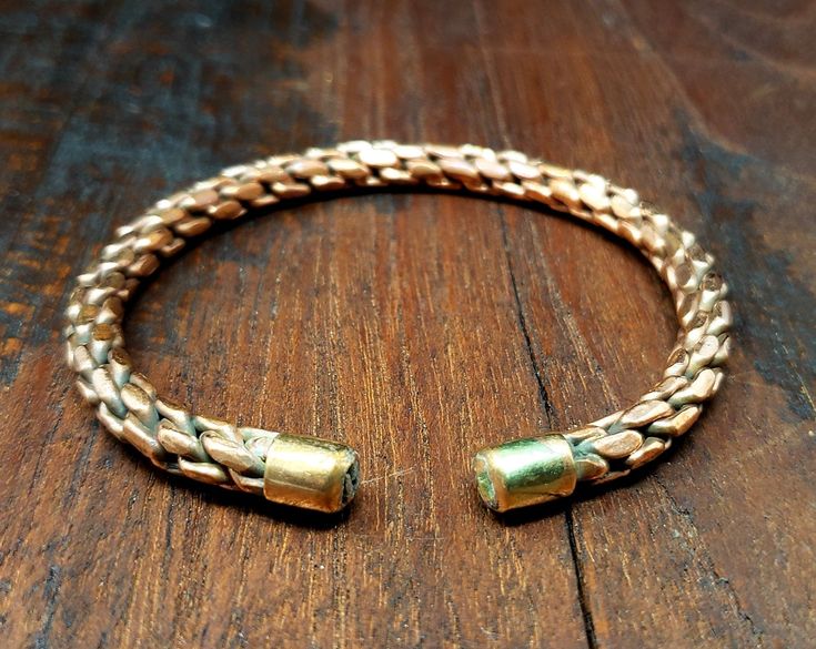 This woven Tibetan copper bracelet is awesome! We personally collected this bracelet while traveling in Kathmandu, Nepal. Made by hand by skilled Tibetan craftsmen using traditional techniques. Made with copper. Easily bends to fit any wrist size. Awesome! *Satisfaction Guarantee* We're sure you'll love this! But if you are not satisfied with your purchase for any reason, then you may return it for a full refund. *About our shop* For years we've traveled the globe, first as English teachers and English Teachers, Turquoise Pendant Necklace, Kathmandu Nepal, Bracelet For Men, Copper Bracelet, Turquoise Pendant, Traditional Techniques, Photo Jewelry, Boho Jewelry