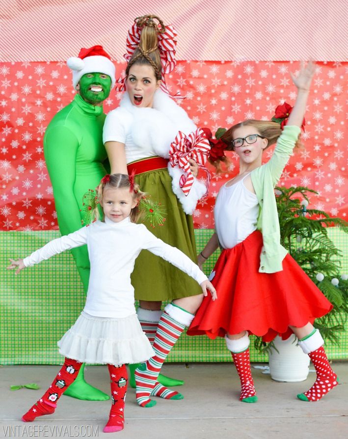 three girls and one boy are dressed up as the grinch, santa's helper and mrs peppermink