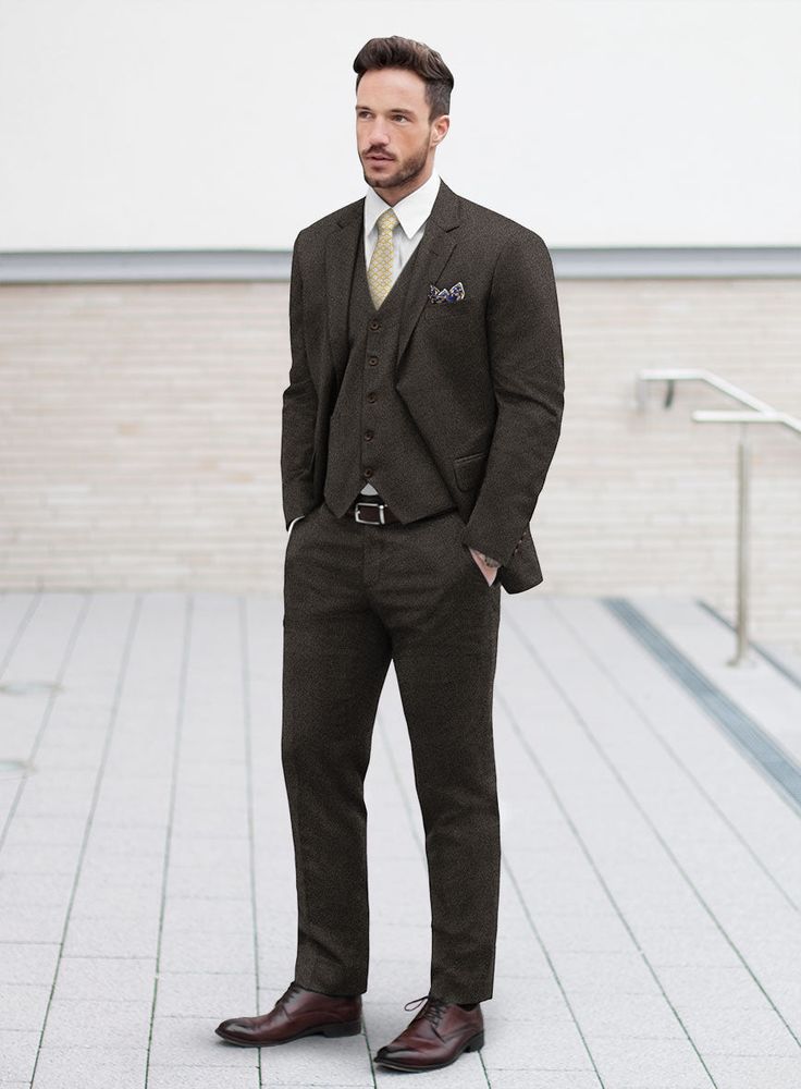 Stay on-trend and enhance your fashion prowess with our impeccably chic Loro Piana Giulio Wool Suit. Fashioned from the finest pure wool, this suit boasts a steadfast solid pattern that seamlessly blends with its understated brown tone. The lavish fabric not only enhances the overall aesthetic but also provides a comforting layer, making it a luxurious and stylish choice for those with discerning tastes. Whether you're attending business meetings or social gatherings with friends, this suit emer Tailored Timeless Three-piece Suit For Workwear, Elegant Wool Three-piece Suit, Single Breasted, Elegant Single Breasted Wool Three-piece Suit, Elegant Wool Three-piece Suit Single Breasted, Three-piece Suit With Welt Pockets For Office, Elegant Single-breasted Wool Three-piece Suit, Three-piece Office Wear Suit With Welt Pockets, Elegant Tailored Wool Three-piece Suit, Semi-formal Wool Pantsuit With Pressed Crease