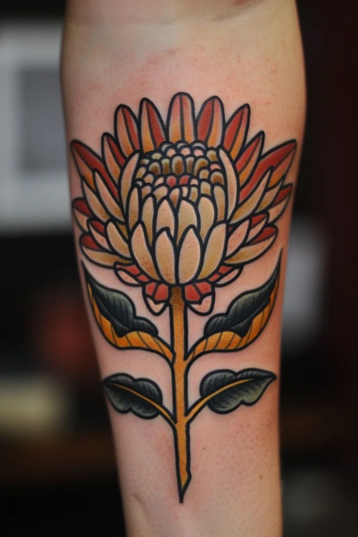 a tattoo on the leg of a woman with a flower in it's center