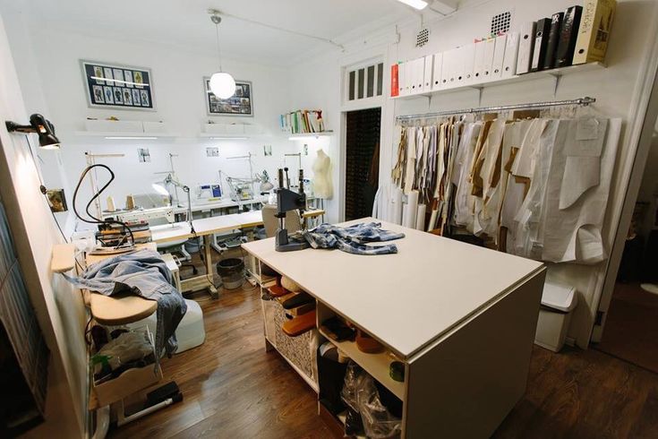 a room filled with lots of clothes on shelves