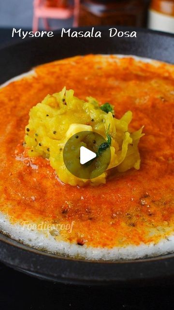 a pan filled with food on top of a stove