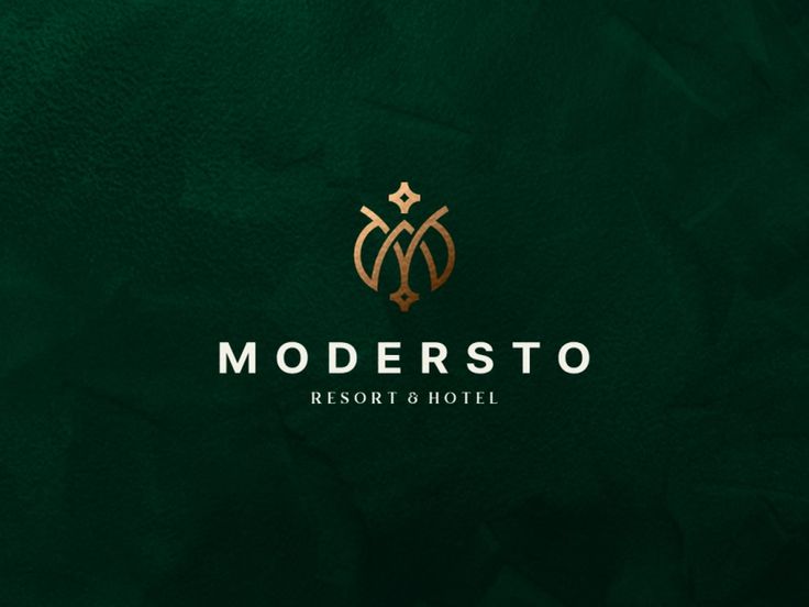 the logo for modern hotel and resort in green with gold foil on it's edges