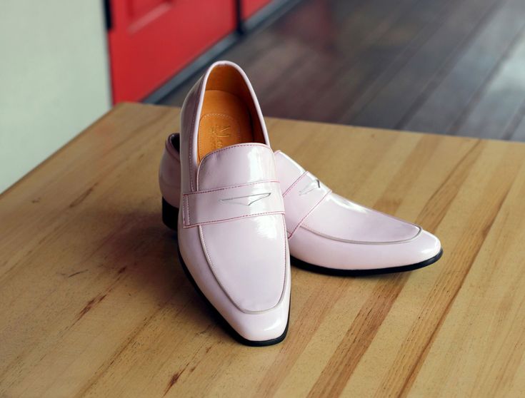 Style: 2240-12P-Pink Elegant Shiny Calfskin slip-on Penny Loafer from the Carrucci by Maurice collection features full Leather Lining and a clean welt! Pink Pointed Toe Loafers For Formal Occasions, Formal Pink Pointed Toe Loafers, Elegant Pink Loafers With Rubber Sole, Elegant Pink Loafers With Round Toe, Elegant Pink Almond Toe Loafers, Classic Pink Loafers With Rubber Sole, Classic Pink Loafers With Leather Sole, Classic Pink Slip-on Loafers, Pink Classic Slip-on Loafers