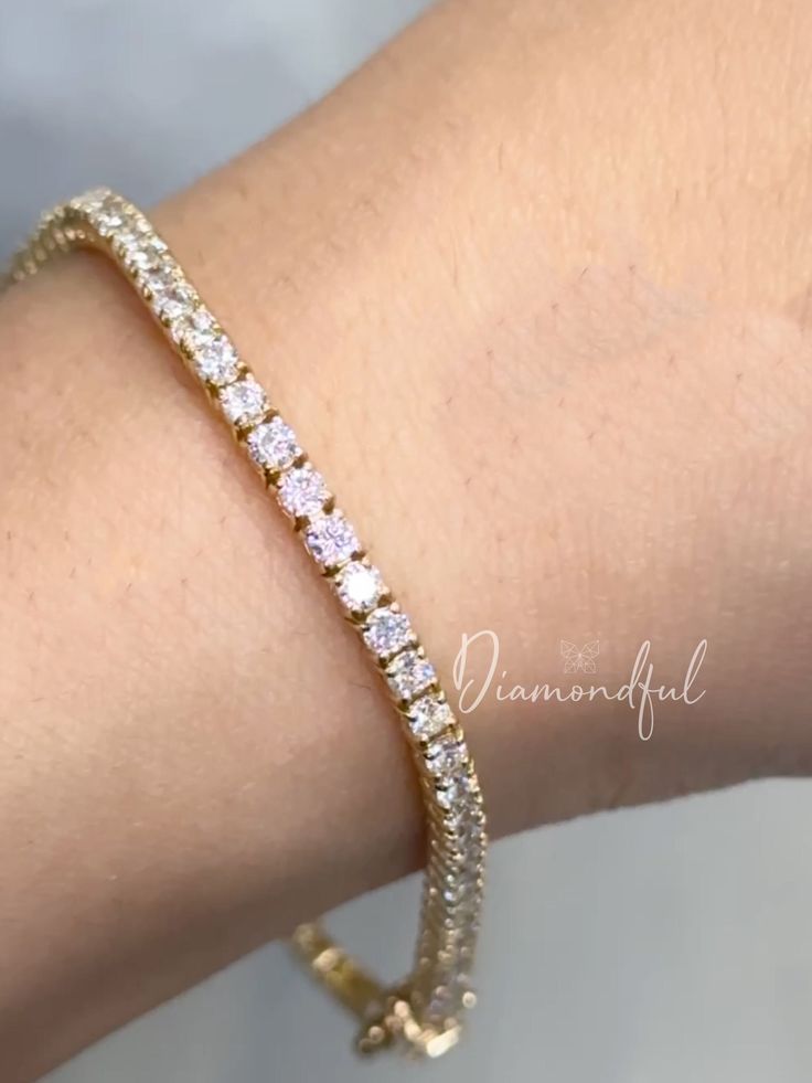 DETAILS: * Handmade item * Gemstone: Lab-grown Diamonds * Band Color: Gold (may vary on gold selection) * Condition: Never been Used; Made to order, Recycled Metal, Conflict-free 100% DESCRIPTION:  💎 Welcome to the Our Shop, Congratulations 🍾 on discovering us. 💎  Beautiful and Elegant, this women's Gold Tennis bracelet is a must-have. This custom-made to-order lab-grown diamond tennis bracelet is the perfect gift for all you beauties who love sparkle and shine. A row of scintillating lab-created round brilliant diamonds are lined up perfectly to create the most stunning diamond bracelet. Made with a double secure lock at the back. Thanks to our trained gemologist who inspects every one of them! A popular cut, this style has become one of today's favorites because it not only shines bri Rose Gold 14k Tennis Bracelet With 17 Jewels, 14k Rose Gold Tennis Bracelet With Jewels, 14k Gold Bracelet For Anniversary, Classic Gold Bracelet With Hand Set Details, Dainty Gold Tennis Bracelet For Formal Occasions, Classic Gold Bracelets With Hand Set Details, Classic Gold Bracelets With Hand-set Details, Dazzling Gold Bracelet As Gift, Dazzling Yellow Gold Tennis Bracelet