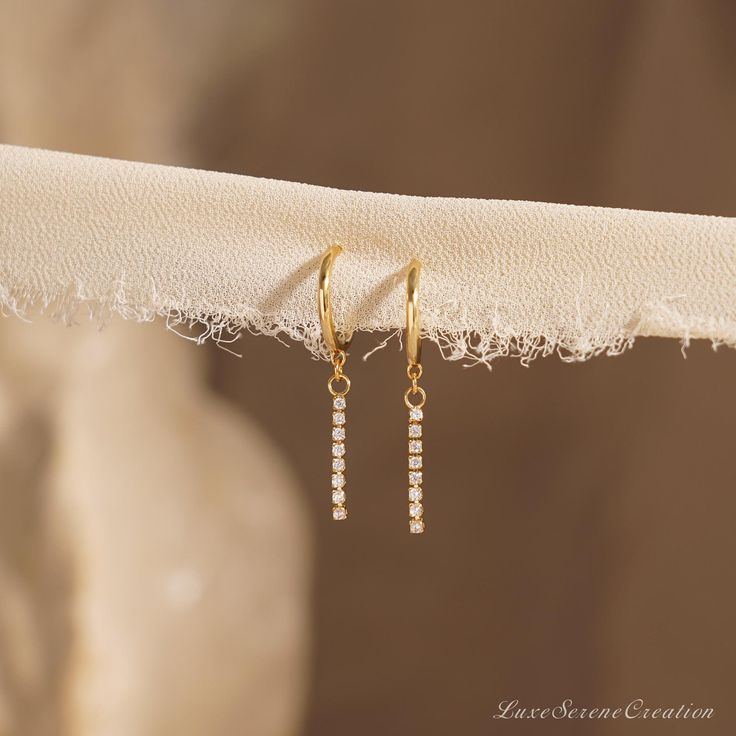 Dainty Diamond Drop Earrings, Minimalist Long Bar Earrings, 18k Gold Fashion Earrings, Chain Tassel Diamond Earrings, Christmas Gift for Her ❤ WHY YOU'LL LOVE IT * Exceptional Craftsmanship: Beautifully designed and built to last. * Meticulous Attention to Detail * Hypoallergenic, Nickel-Free & Safe for Sensitive Skin ❤ WHAT YOU'LL GET * A Heartfelt Product: A beautifully crafted item designed to captivate. * Packaged with ♡: Presented in a pretty little box, READY for GIFTING. * Finish: 18K Gol Minimalist Dangle Threader Earrings For Anniversary, Dainty Linear Earrings For Anniversary, Delicate Dangle Diamond Earrings For Gift, Dainty Dangle Linear Earrings For Anniversary, Minimalist 14k Gold Filled Earrings For Party, Minimalist 14k Gold Filled Party Earrings, Minimalist Linear Earrings For Anniversary, Minimalist Single Linear Earring For Anniversary, Dainty Single Linear Earring As Gift