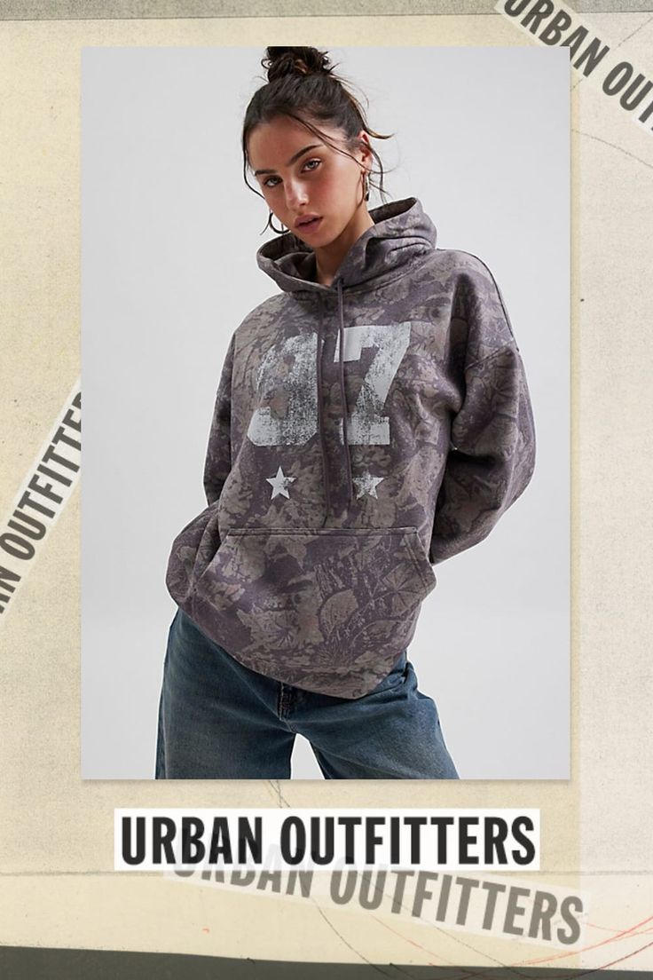 Hoodie sweatshirt in an overzised, relaxed fit in an all-over camo print. Designed with a crew neckline with hoodie & string details, a distressed 97 graphic across the front and topped with a kanga front pocket. Only at Urban Outfitters. Features Camo graphic hoodie sweatshirt Oversized hoodie sweatshirt All-over camo printed knit Crew neckline with hood & string details, drop shoulders and balloon sleeves Distressed 97 graphic across the chest Front kanga pocket Relaxed, oversized fit Regular length Easy pull-over style UO exclusive Content + Care 50% Cotton, 50% polyester Machine wash Imported Size + Fit Model in Camo is 5’9.5" and wearing size S/M Measurements taken from size S/M Chest: 46" Length: 27" | Camo Graphic Hoodie Sweatshirt in Camo, Women's at Urban Outfitters Camouflage Outfits, Camo Sweatshirt, Camo Outfits, Sweatshirt Oversized, Camo Hoodie, Fall Hoodies, Trendy Fall Outfits, Graphic Tees Vintage, Urban Outfitters Women