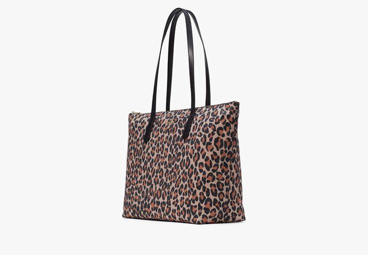 You know this tote holds your everyday stuff like a wallet keys phone sunglasses. It also holds: two red lipsticks $6 in change 11 crumpled receipts an avocado… | Kate Spade Kitt Nylon Leopard Extra Large Tote, Brown Multi Casual Everyday Kate Spade Bags, Versatile Kate Spade Shoulder Bag For Travel, Packable Double Handle Bag, Versatile Kate Spade Bags For On-the-go, Versatile Kate Spade Tote Bag, Versatile Kate Spade Bag For Everyday, Versatile Kate Spade Bags, Medium On-the-go Shoulder Bag, Kate Spade Travel Bags With Zipper Closure