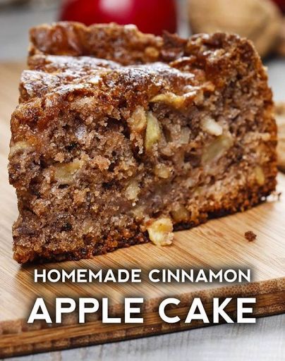 homemade cinnamon apple cake on a cutting board with the words homemade cinnamon apple cake above it