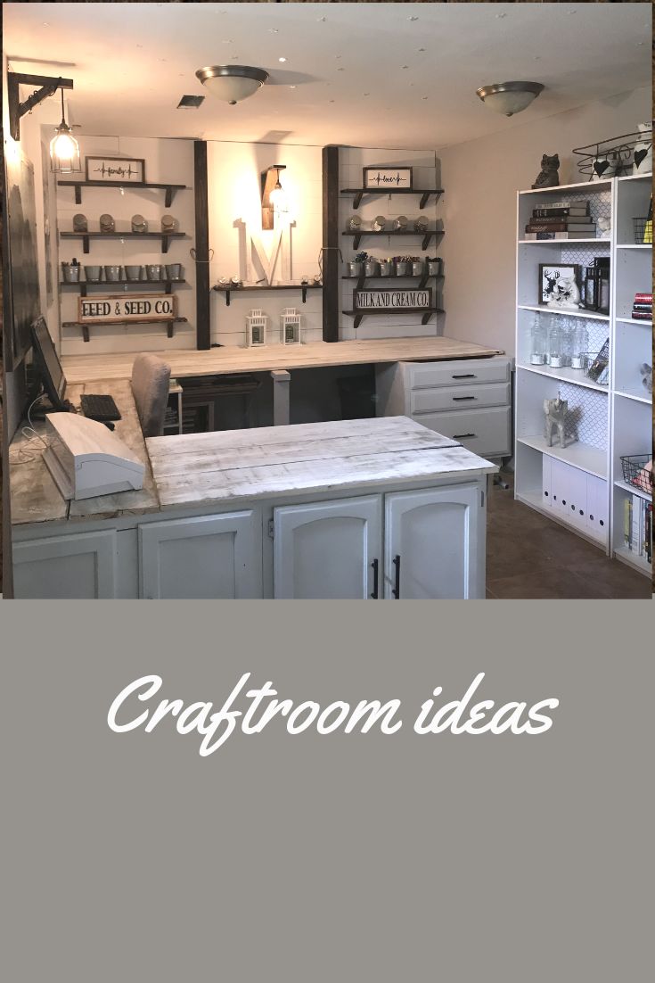 a kitchen with white cabinets and shelves filled with items