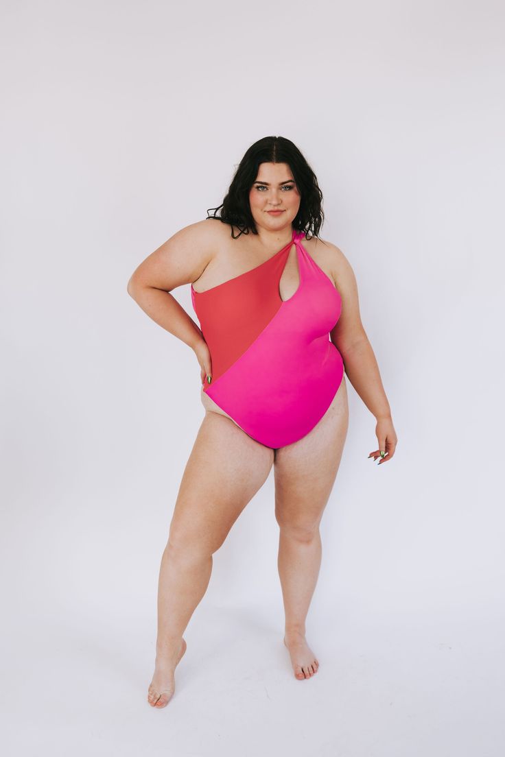 Beach-ready and beautiful in hot pink and red, our PLUS SIZE - Beach Bliss One Piece will have heads turning! With one shoulder-style and cheeky coverage, this one-piece swimsuit will make a splash! (And, of course, make you look FAB-ulous!) Details One-piece swimwear Removable padding Cheeky fit One shoulder Fully lined Sizing Approximate measurements: SIZE LENGTH BUST 1XL 29" 34” 2XL 30” 36" 3XL 31” 40” Fabric has stretch Model is 5’8” wearing 3XL Material 82% Polyester 18% SpandexHand wash co Pink One-shoulder Swimwear For Pool, One-shoulder Pink Swimwear For Beach, Red One-shoulder Swimwear For Poolside, Plus Size One Piece Pink, Pink One-shoulder Swimwear, Cheap Pink One-piece For Poolside, Pink One-shoulder Beachwear Swimwear, Pink One-piece Swimsuit For Sunbathing, Pink One-piece Swimwear For Pool