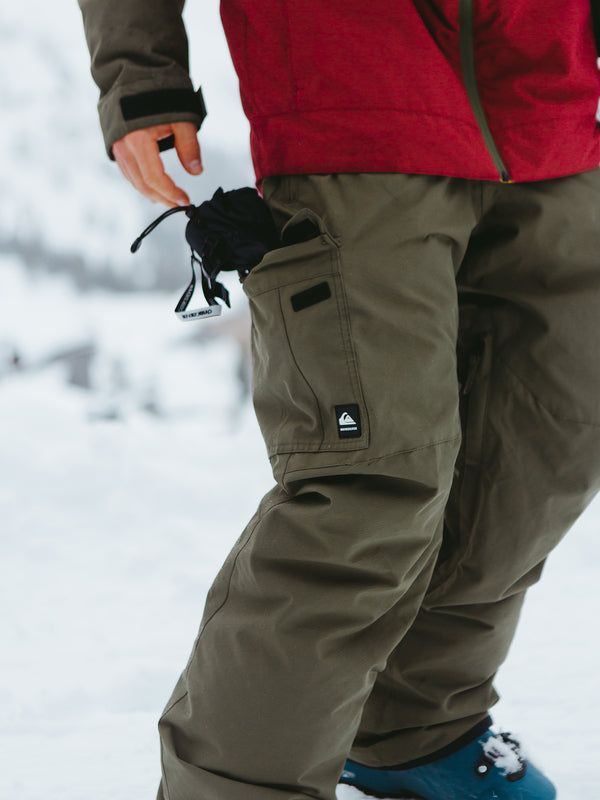 Rider-driven, mountain made. These men's snowboard pants feature a street-inspired regular fit and 10Ks of breathable waterproofing power to keep you warm and dry in a range of conditions. The Ported Insulated Snow Pant is equipped with winter-ready extras include handy cargo pockets, vents for temp control and a cuff saver system to keep your hems looking fresh all season long. Style EQYTP03145 Features Waterproofing: 10K Quiksilver DryFlight® Technology for better waterproofing [10,000 mm/5000 Vans Pants, Snowboarding Men, Grape Leaf, Snowboard Pants, Snow Pants, Long Style, Canada Goose Jackets, Body Shapes, Porter