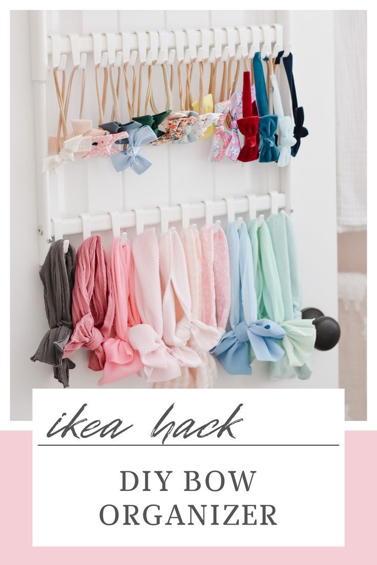 the diy bow organizer is hanging on a wall