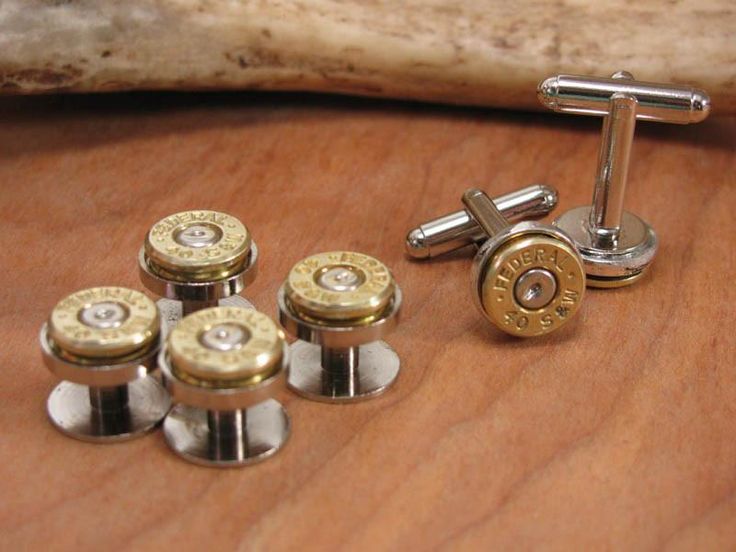 Whether for a formal occasion, wedding party accessories or groomsmen gifts, these cufflink and tuxedo button sets will put you out in front with class as well as reflect your style. Matching set includes a pair of cuff links and set of 4 tuxedo buttons. Both will have matching casings in brass. Caliber and brand will vary and restricted to the bezel cup size of these components. This means calibers such as 9mm, 38 special. 357 and 40 S&W will be used. Want to choose your caliber from the on Groomsmen Cufflinks Wedding, Wedding Cuff Links, Cuff Links Wedding, Cuff Links, Cuff Links For Men, Groomsmen Gifts, Groomsmen Gifts Cufflinks, Screw Back Cufflinks For Wedding, Wedding Cuff