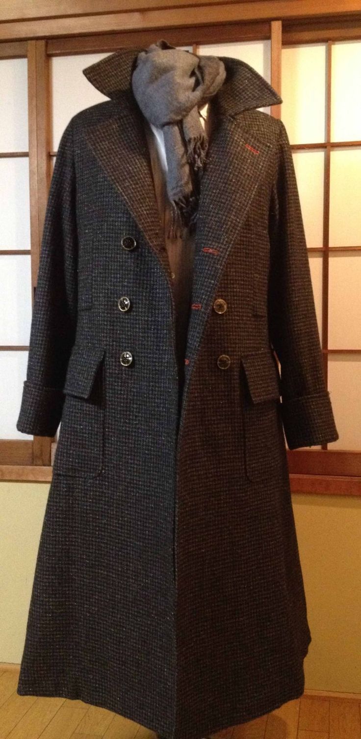 a coat on display in front of a window