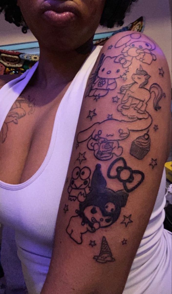 a woman with a tattoo on her arm