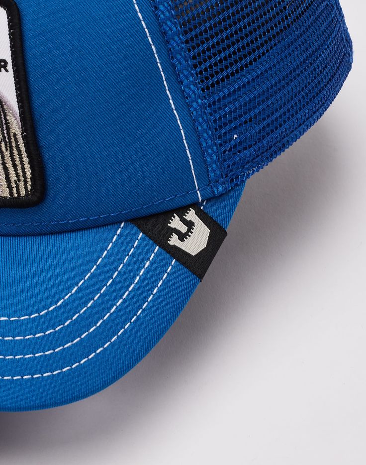 Shop Goorin Bros The Stripe Earner Trucker Hat at Tops and Bottoms USA. Enjoy free shipping on All over the USA. Style: 201-0046-BLU, Color: Blue Adjustable Blue Hats With Mesh Back, Casual Blue Trucker Hat With Mesh Back, Blue Cap With Mesh Back, Blue Breathable Hat With Curved Brim, Breathable Blue Hat With Curved Brim, Blue Curved Brim Breathable Hat, Blue Breathable Curved Brim Hat, Blue Breathable 5-panel Baseball Cap, Blue Mesh Back Cap