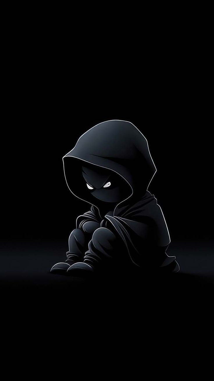 a person sitting in the dark with a hoodie over their face and hands on their knees