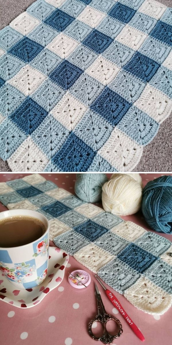 there is a crocheted blanket on the floor next to a cup of coffee