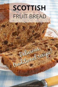 a loaf of fruit bread sitting on top of a plate