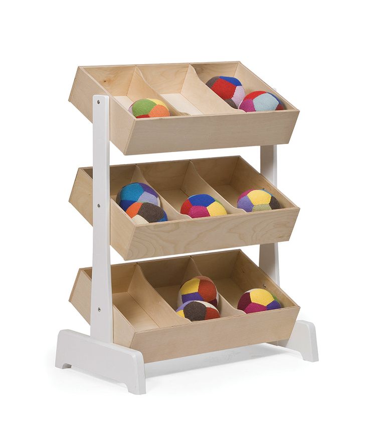 three tiered wooden toy storage unit with multicolored balls