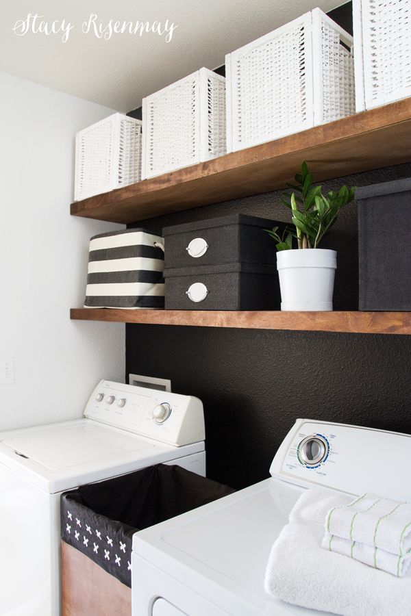 a white washer and dryer sitting next to each other in a laundry room