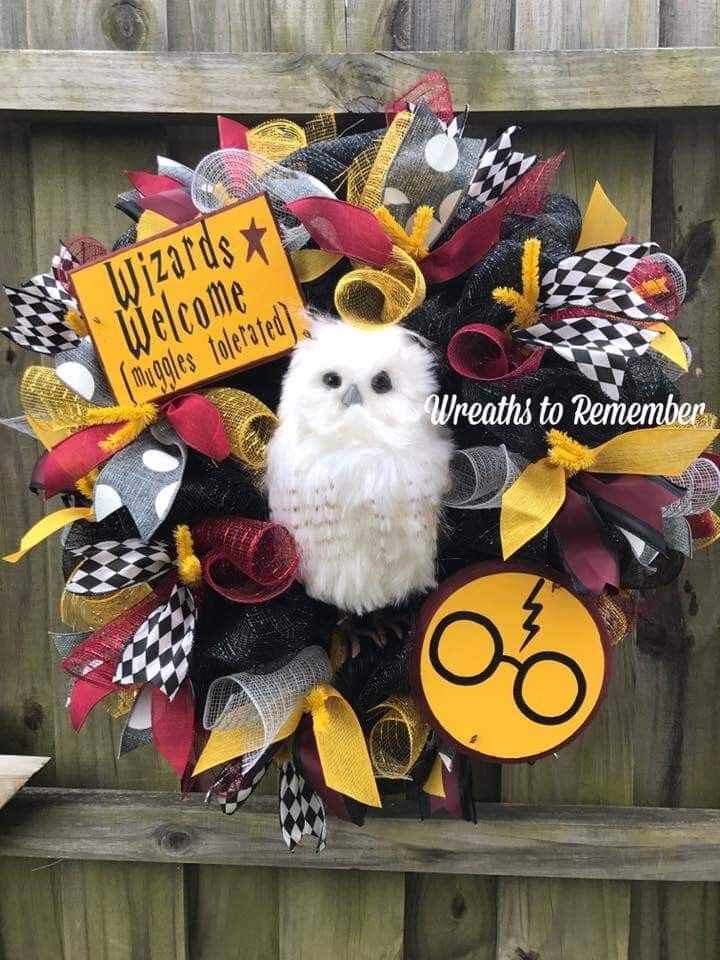 a harry potter wreath with an owl on it