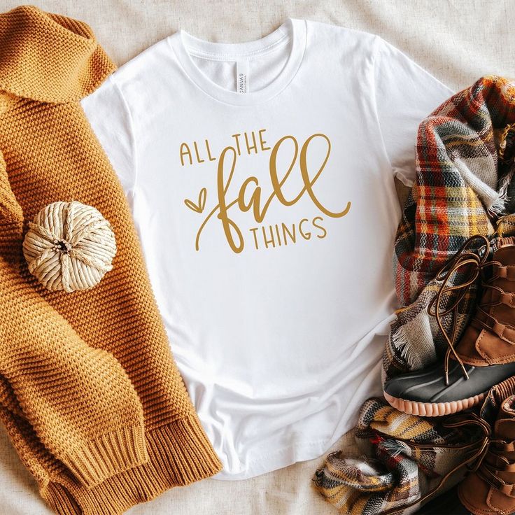 Looking for a cute versatile top to wear this summer? Make sure to grab one of our Caffeine And Kindness tees! This soft and comfortable graphic tee is the perfect top for any outfit. It can be paired with biker shorts, jeans, or even a simple skirt/dress! This tee is true-to-size, so be sure to order your regular t-shirt size! If you are looking for a more oversized look, make sure to size up! Lyric Shirts, Mauve Blush, Fall Shirts Women, Fall Things, Pumpkin Spice Season, Queen Shirts, Fall Watercolor, Fall Tee, American Flag Shirt