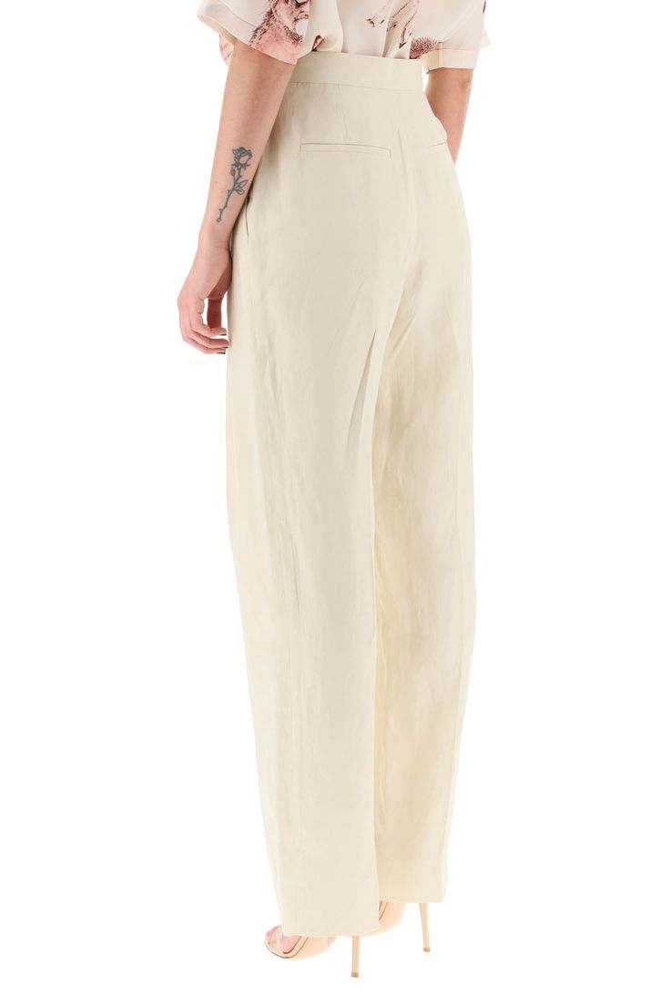 72% Viscose, 28% Linen Elegant Silk Pants With Relaxed Fit, Elegant Relaxed Fit Silk Pants, Chic Silk Pants With Relaxed Fit, Elegant Silk Bottoms With Relaxed Fit, Silk Wide Leg Bottoms With Relaxed Fit, Silk Wide-leg Pants With Relaxed Fit, Relaxed Fit Silk Trousers, Chic Silk Straight Leg Bottoms, Wide-leg Silk Pants For Spring