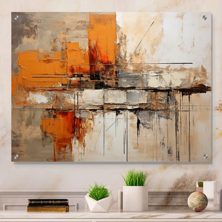 an abstract painting is displayed on the wall