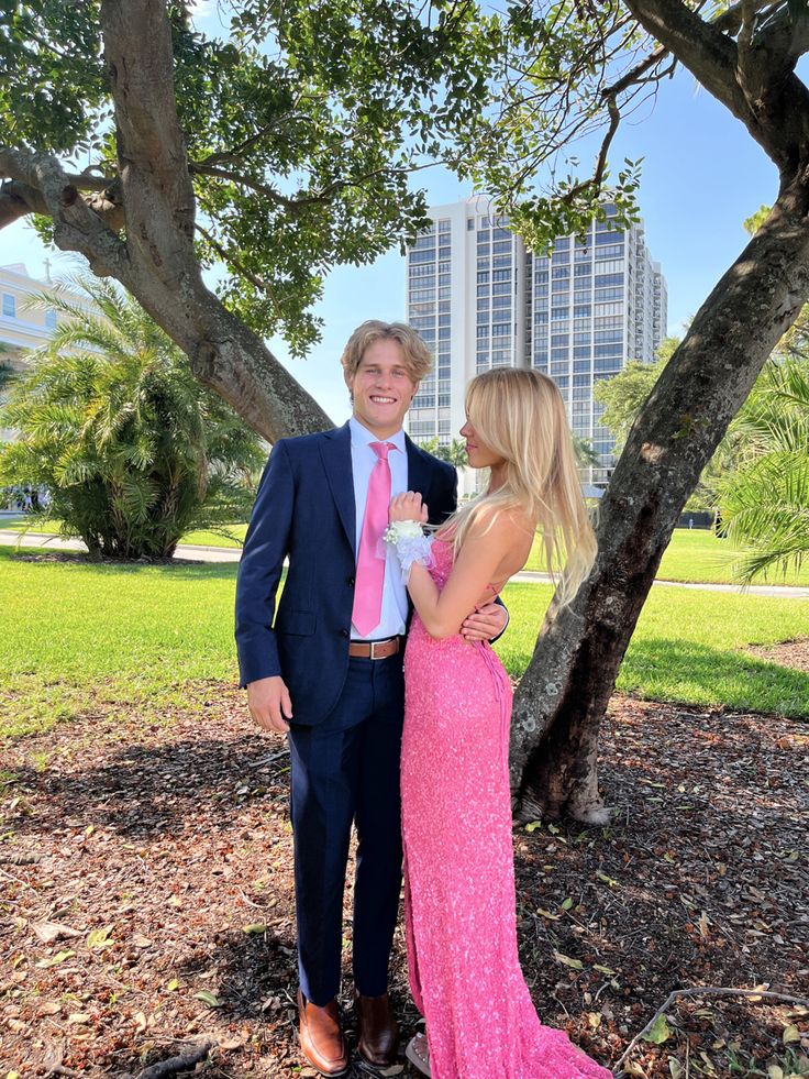 Navy And Pink Homecoming Couple, Prom Dresses With Navy Suit, Navy And Pink Prom Couples, Homecoming Couples Outfits Pink, Light Pink Prom Dress With Navy Blue Suit, Bright Pink Prom Couple, Pink And Blue Prom Couple, Pink Prom Dress And Tux Ideas, Pink Prom Dress And Date