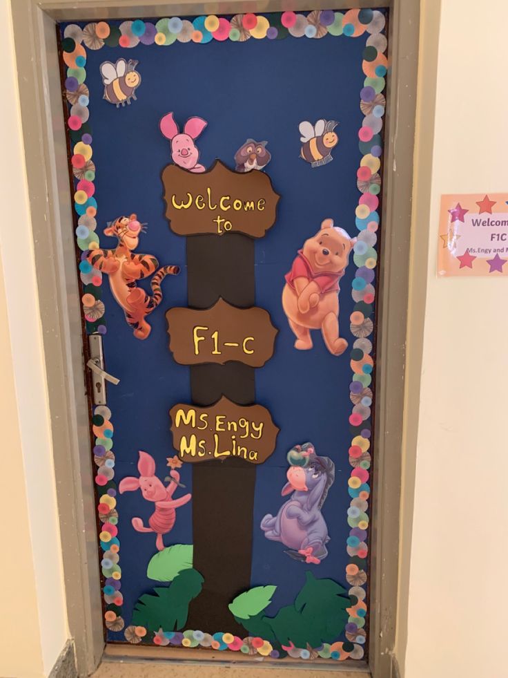 a door decorated with winnie the pooh decorations