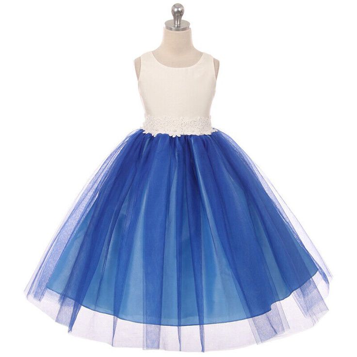 Sleeveless two tone organza and tulle girl dress. Beautiful lace accents the waistline. Adjustable waist with back tie. Additional netting under the skirt for volume look. Tea length. Center back zipper. Fully lined for comfort. Perfect for special occasions. MADE IN USA COLOR: ROYAL BLUE FINAL SALE Flower Girl Dresses Blue, Girls Holiday Dresses, Girls Blue Dress, Tulle Flower Girl, Wedding Flower Girl Dresses, Tulle Flowers, Satin Tulle, Dress Birthday, Flower Girl Dresses Tulle