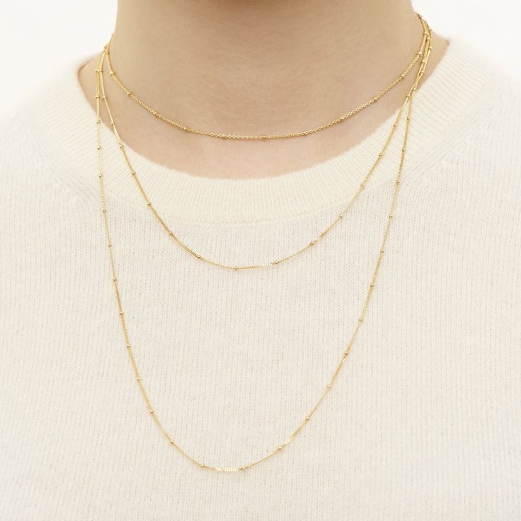 This super delicate necklace was made for layering and features stations to add a subtle touch of texture. Pair with the coordinating bracelet or anklet. 14k Gold Ball Chain Necklace, Classic Beaded Chain Necklace With Round Beads, Classic Gold Ball Chain Necklace, Classic Yellow Gold Jewelry With Ball Chain, Classic Necklace With Delicate Chain And Round Beads, 14k Gold Beaded Chain Necklace With Round Beads, 14k Gold Beaded Chain Necklace, Classic Everyday Chain Necklace With Round Beads, Everyday Classic Chain Necklace With Round Beads