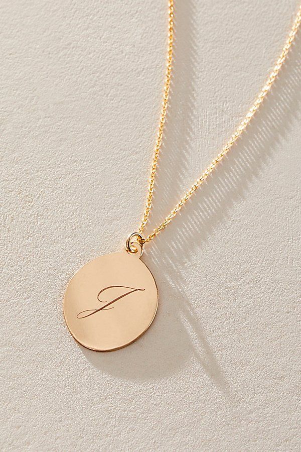 Just as effortless as it is elegant, this stunning necklace features an oval pendant with gorgeous cursive engraved initial for the ideal finishing touch. * 14k Gold Filled chain * Personalized, laser engraved, 14k Gold Filled 17x22mm oval pendant * Length: 20" * 5 days of production | Set & Stones Personalized Amelia Necklace at Free People in Gold Elegant Oval Charm Necklaces For Anniversary, Elegant 14k Gold Charm Necklace With Oval Pendant, Elegant 14k Gold Oval Pendant Charm Necklaces, Elegant Personalized Initial Necklace For Formal Occasions, Elegant 14k Gold Oval Pendant Charm Necklace, Elegant Oval Necklaces With Engraving Option, Classic Oval Link Personalized Necklace, Elegant Sterling Silver Engraved Initial Necklace, Elegant White Gold Initial Necklace For Personalized Gift