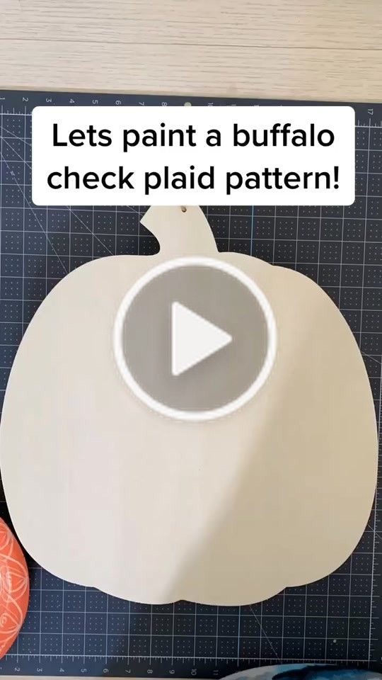 a video demonstrating how to paint a pumpkin